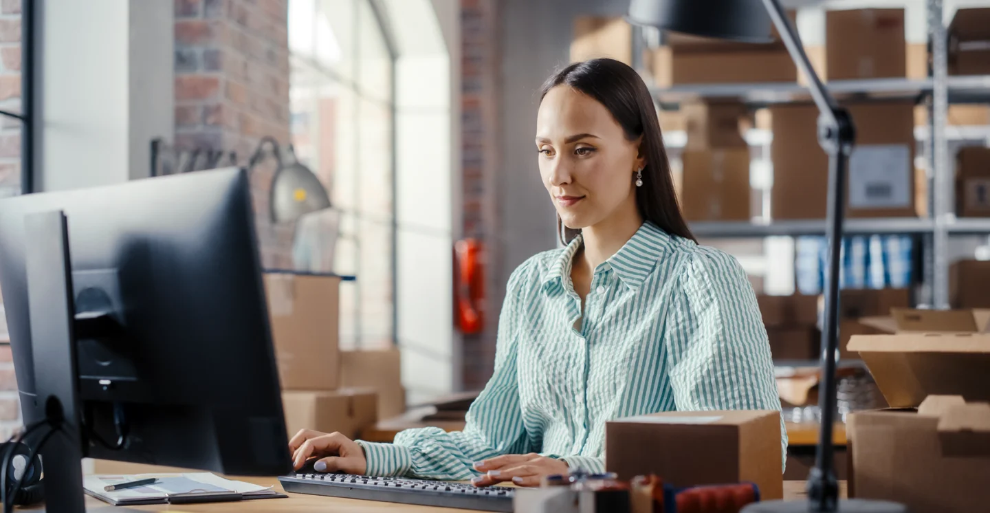 Manager organizing warehouse logistics