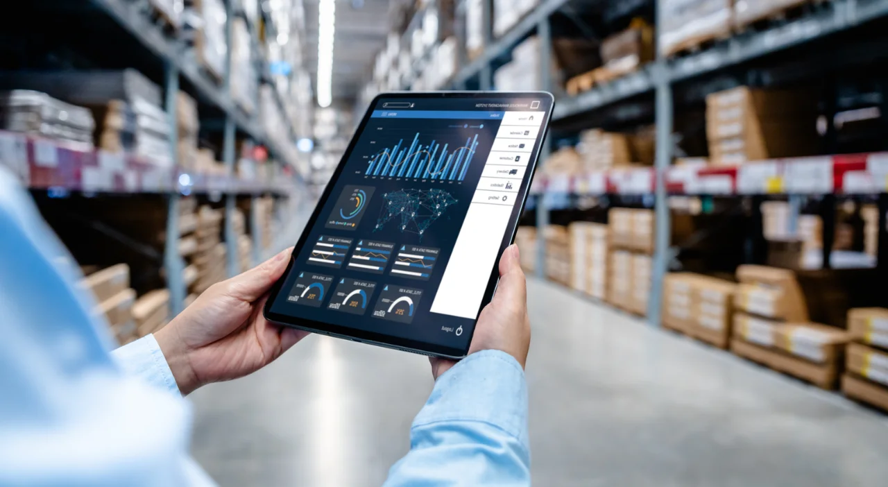 Professional reviewing logistics dashboard