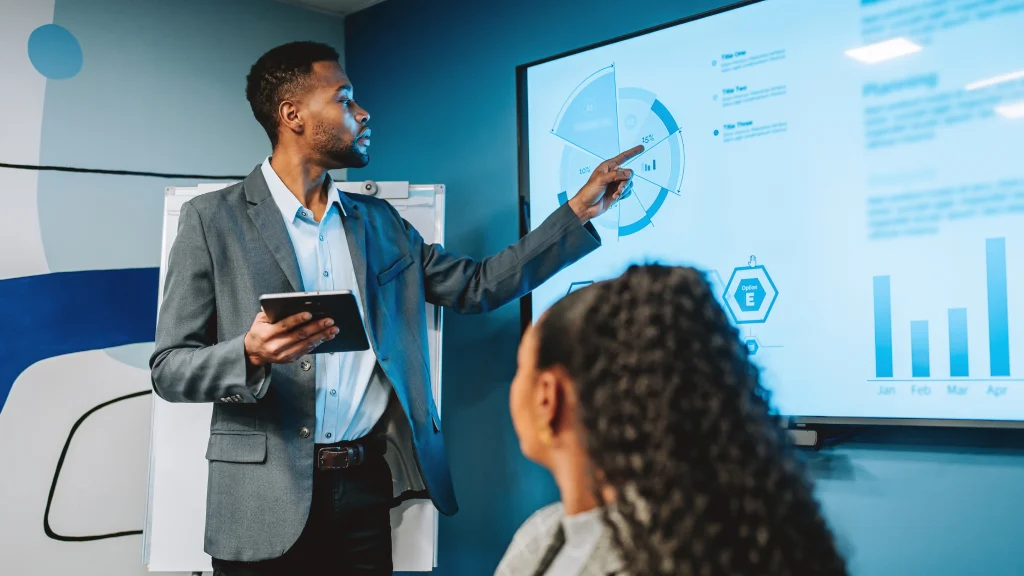 Manager pointing to analytics